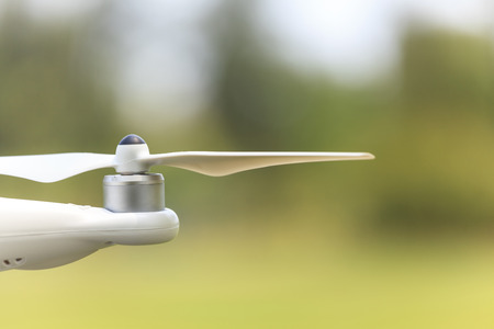 White drone with camera