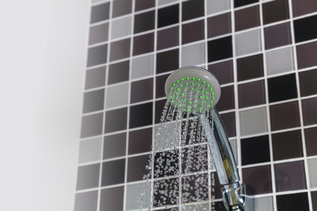 Shower in bathroom with falling water down