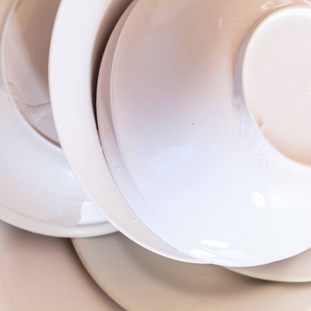 Dirty Plates and dishes in the sinkの写真素材