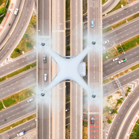 Top view of drone flying over the road and highway