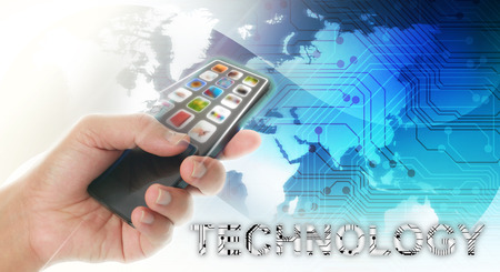 Hand holding smartphone on abstract technology background
