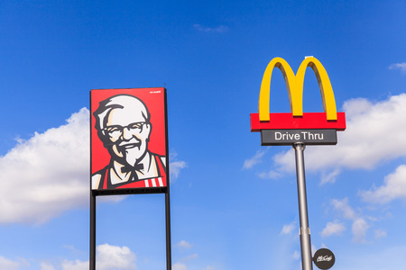 BURIRAM, THAILAND- DECEMBER 27, 2016: Exterior view of KFC drive thru and McDonald's drive thru in Buriram, THAILAND. It is the world's largest fast food restaurants.のeditorial素材