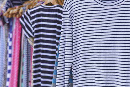 Clothing on hanger at the shopの写真素材