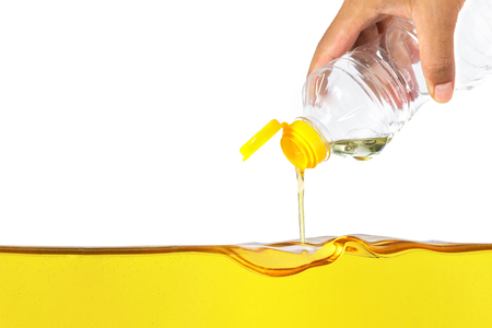 Vegetable oil pouring on vegetable oil backgroundの写真素材