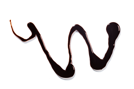 Abstract pattern of Chocolate sauce on white backgroundの写真素材