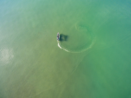 Top view of fishing boats in the sea, Fishing boat floating in the seaの写真素材
