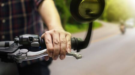 Close up of a high power driving a motorcycleの写真素材