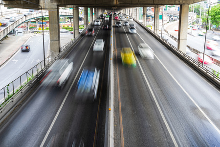 Motion blur of car on the road in the city