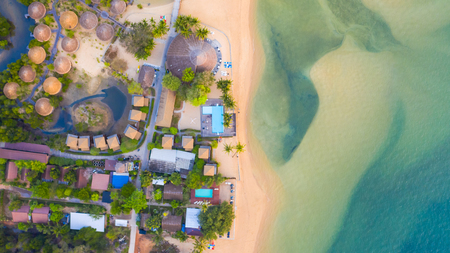 Aerial top view, Resort and beach with emerald blue water on beautiful tropical sea in thailandの写真素材