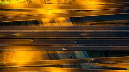 Aerial top view of highway, Transport city junction road with car on Intersection cross road at...