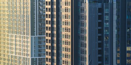 Side view with new modern building construction in backgroundの写真素材