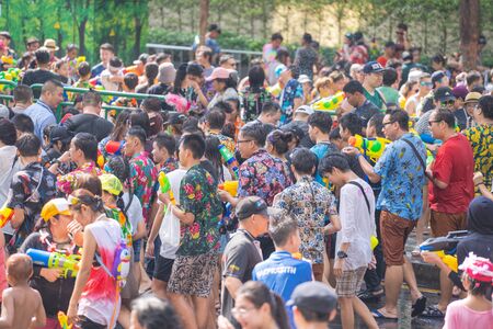 BANGKOK, THAILAND - APRIL 14: Unidentified Thai and International people enjoy in "Bangkok Songkran Festival 2019 (Thailand new year)" at Silom Road on April 14, 2019 in Bangkok, Thailandのeditorial素材