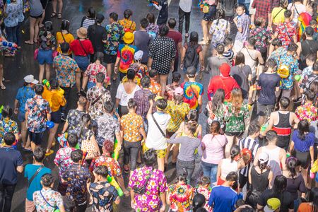 BANGKOK, THAILAND - APRIL 14: Unidentified Thai and International people enjoy in "Bangkok Songkran Festival 2019 (Thailand new year)" at Silom Road on April 14, 2019 in Bangkok, Thailandのeditorial素材