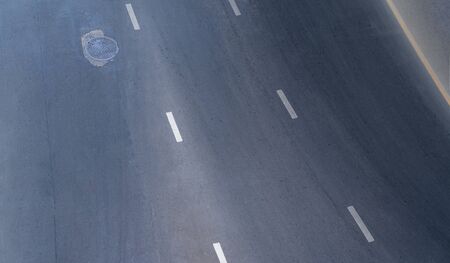Aerial photo top view over empty traffic street road in cityの写真素材