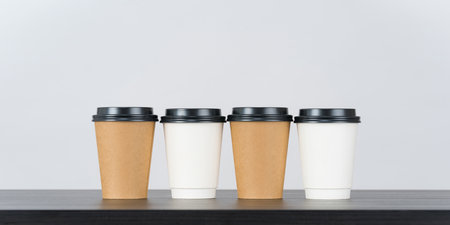 Blank paper coffee cup set on white backgroundの写真素材