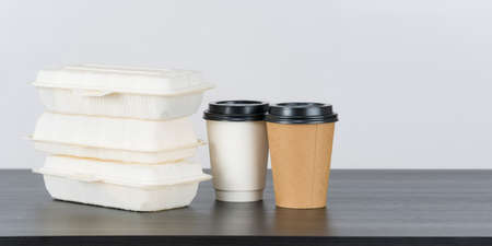 Blank paper coffee cup set with paper food containers on white backgroundの写真素材