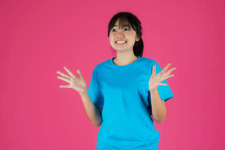 Asian woman working with calculator, Selling online ideas concept, Online seller business shop at homeの写真素材