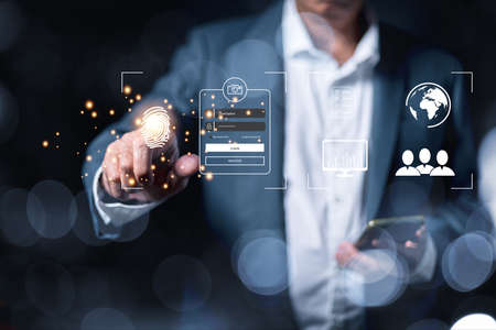 a person touching the virtual screen to scan fingerprints To enter the online system, the concept of online business management. internet of things Automation, Big Data, Storage Systems, cloud computingの写真素材