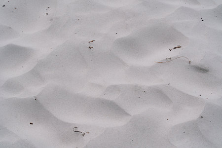 White sand beach with ripples and textures