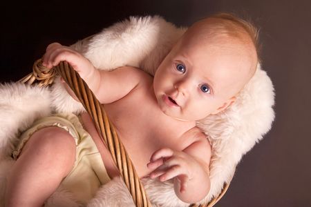 baby boy in wicker basket (4 month old ) 