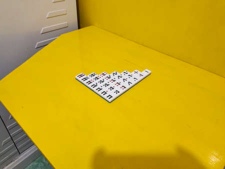 Medan, Indonesia - January 13, 2021: Dominoes On Yellow Background, Medan City, Indonesia.
