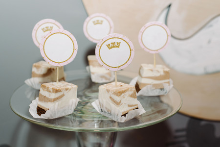 Festive table for newlyweds and guests. Dessert table for a wedding party and birthdayの写真素材