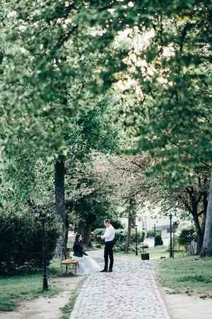 A young, sympathetic couple walks through the streets of the city. Loveの写真素材