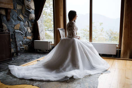 Young pretty girl dressed in a wedding dressの写真素材