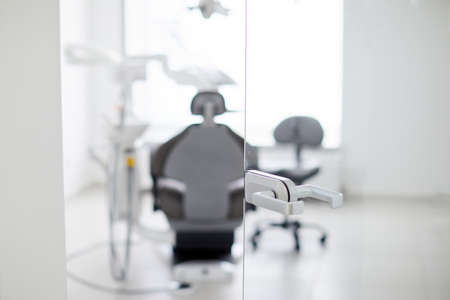 Dentist's office interior with modern chair and special dentisd equipmentの写真素材