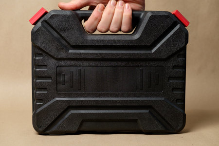 Handheld tool case showcasing essential equipment for home repairsの写真素材