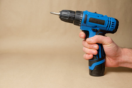 Essential tools for home renovation with a focus on cordless drill functionalityの写真素材