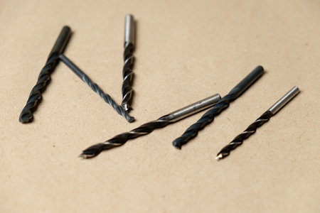 Explore the essentials of a tool kit with various drill bits for home repairsの写真素材