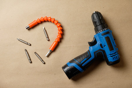 Essential tools for home repair projects featuring a battery-powered drillの写真素材