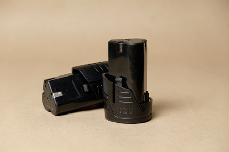 Essential tools for home repairs featuring black battery packs for drillsの写真素材