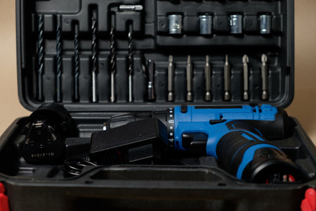 Cordless drill toolkit with essentials for home projectsの写真素材