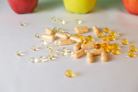 Healthful choices blend with vibrant fruits and dietary supplements on the tableの写真素材