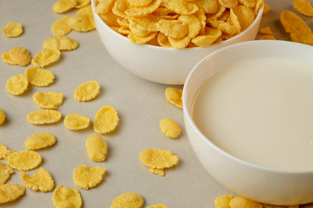 Delicious corn flakes and milk create a joyful breakfast momentの写真素材