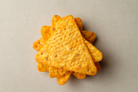 Delicious nacho chips piled high, ready for a tasty snack moment anytimeの写真素材