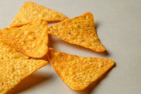 Crispy nacho chips ready for dipping and sharing during a cozy gatheringの写真素材