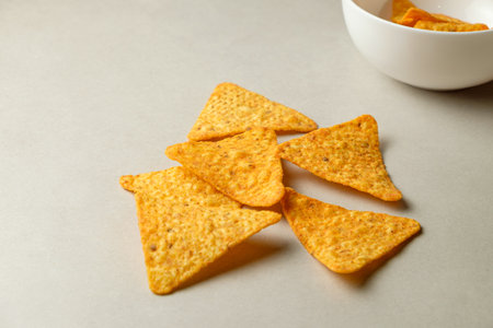 Crispy nacho chips ready for a flavorful snack experience at homeの写真素材