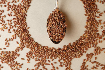 Harvesting the wholesome goodness of organic brown rice on a rustic tableの写真素材