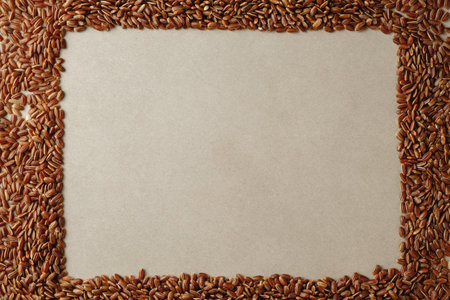 Brown rice arranged artistically on a simple backdrop for culinary inspirationの写真素材