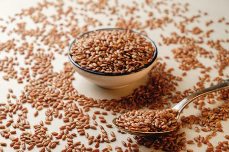 Organic brown rice creates a rustic culinary backdrop in a kitchen settingの写真素材
