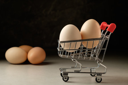 Shopping cart filled with eggs makes a quirky kitchen scene at dusk