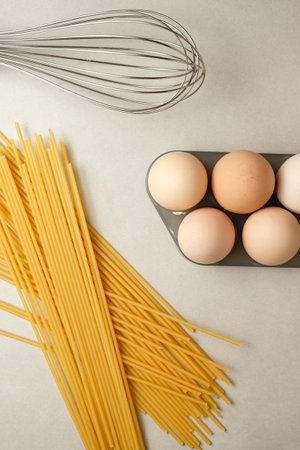 Fresh ingredients ready for a delightful pasta dish preparationの写真素材