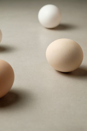 Lovely assortment of fresh eggs resting on a smooth kitchen countertopの写真素材