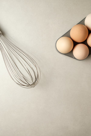 Gathering ingredients for a delicious breakfast with eggsの写真素材
