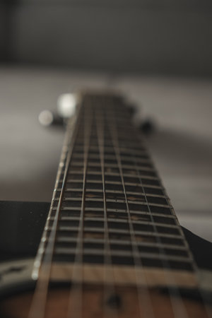 Close up of a beautiful guitar revealing its strings and craftsmanshipの写真素材