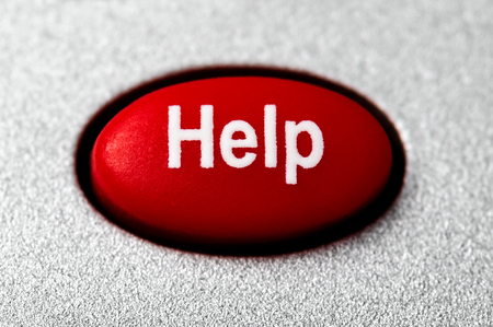 Red help button picture with a grainy silver surrounding