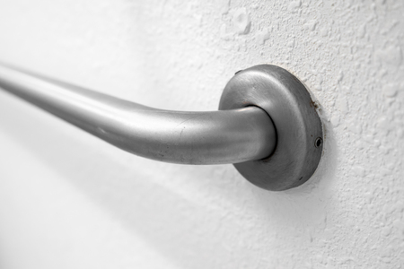 Disabled Access Bathroom Hand Rail Grab Bar in a Hotel Bathroomの写真素材